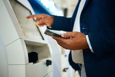 Buy stock photo Hand, phone and atm with a business black man at the bank to withdraw cash from a convenient machine. Money, finance and smartphone with a male employee making a financial transaction on credit