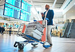 Luggage trolley, airport and black man passport and ticket for international travel, global opportunity or immigration. Self service, suitcase and African person walking with documents for flight