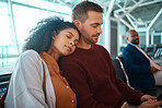 Airport, travel and woman sleeping by her boyfriend while waiting to board their flight together. Tired, exhausted and female taking a nap for rest on the shoulder of her man in the terminal lounge.