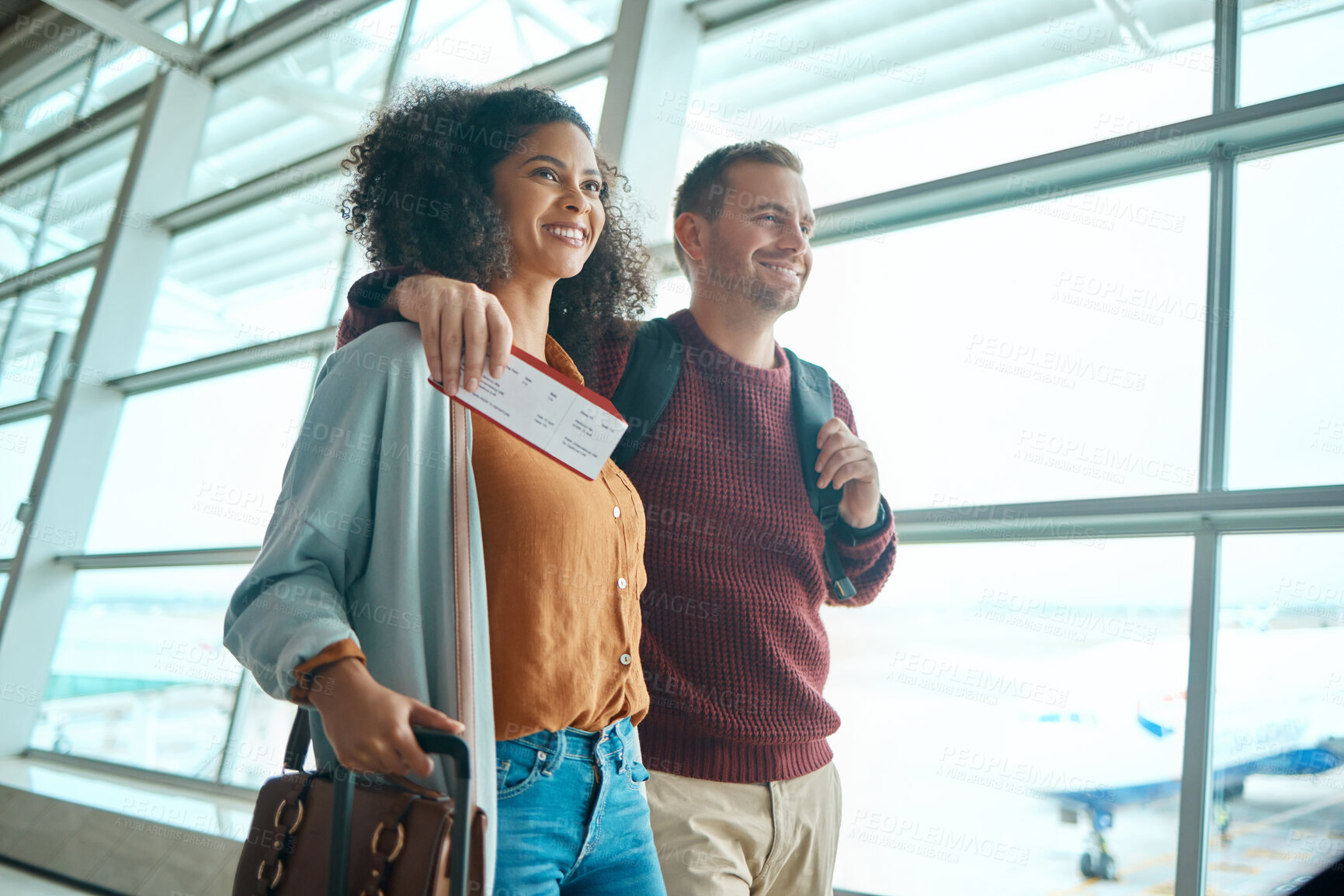 Buy stock photo Travel, airport and happy couple with ticket or boarding pass for international flight for holiday destination together. Smile, woman and man with visa for travelling to foreign country for vacation.