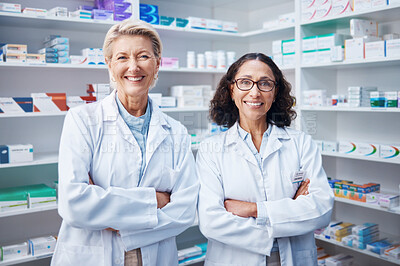 Buy stock photo Teamwork, portrait and pharmacists with arms crossed in pharmacy, drugstore and medicine shop. Healthcare, pharma wellness and happy, proud and confident smile of medical doctors or senior women.