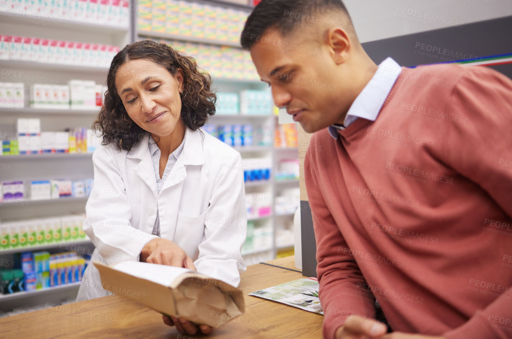 Buy stock photo Pharmacy, medicine information and customer with pharmacist talking about pills side effects. Reading, prescription info and healthcare worker with customer service for health and wellness check