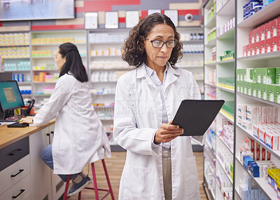 Buy stock photo Pharmacy medicine, pharmacist woman and tablet product management, stock research and inventory. Digital technology, retail logistics and mature medical doctor or person with pharmaceutical database