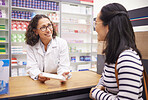 Senior woman, drugs consulting and customer with pharmacist talking about pills side effects. Reading, prescription info and healthcare worker with health, support and wellness check information