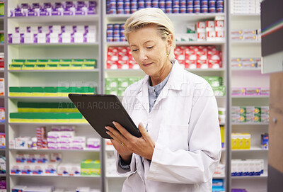 Buy stock photo Pharmacy, tablet and pharmacist woman for product management, stock research and inventory data app. Digital technology, retail logistics and senior healthcare doctor or person with medicine software