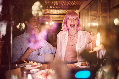 Buy stock photo Happy couple at dinner, celebration at restaurant with fine dining, love and anniversary with young people laughing. Funny, happiness and eating, care in relationship with commitment and partnership