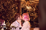 Love, kiss and wine with couple in restaurant for date, romance or affectionate in outdoors. Celebration, anniversary and valentines day with man and woman in bonding for passionate, flirt or dinner