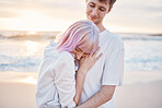 Love, beach and young couple on date for valentines day, ocean fun and romantic embrace at sunset. Romance, happiness and gen z woman and man hug on tropical valentine holiday in Indonesia in evening