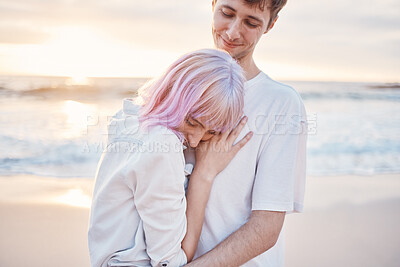 Buy stock photo Love, beach and young couple on date for valentines day, ocean fun and romantic embrace at sunset. Romance, happiness and gen z woman and man hug on tropical valentine holiday in Indonesia in evening