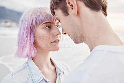 Buy stock photo Intimacy, beach and couple with a love moment while on summer date for valentines day or anniversary. Romance, sea and young gen z man and woman with intimate embracing by ocean together in Australia