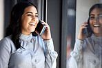 Phone call, reflection and communication with a business woman in the office, talking on her mobile. Contact, networking and window with a young female employee chatting on her smartphone at work
