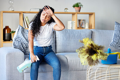 Buy stock photo Tired woman, housekeeper and detergent on sofa in the living room for cleaning, hygiene or disinfection at home. Exhausted female maid or cleaner in burnout, stress or fatigue for routine maintenance