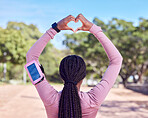 Fitness, heart hands and black woman with phone monitor for running, cardio and workout progress, health and data.  Sports person rear or athlete runner with love emoji and smartphone for training