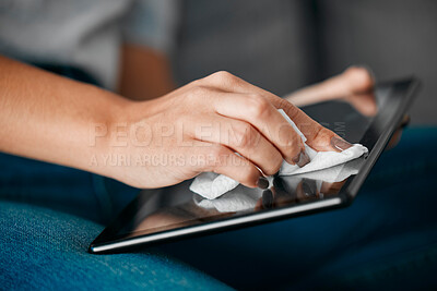 Buy stock photo Woman hands, tablet and cleaning screen for dust, dirt risk and bacteria safety in home. Female, girl and device disinfection with microfiber cloth, surface care and hygiene of technology for health
