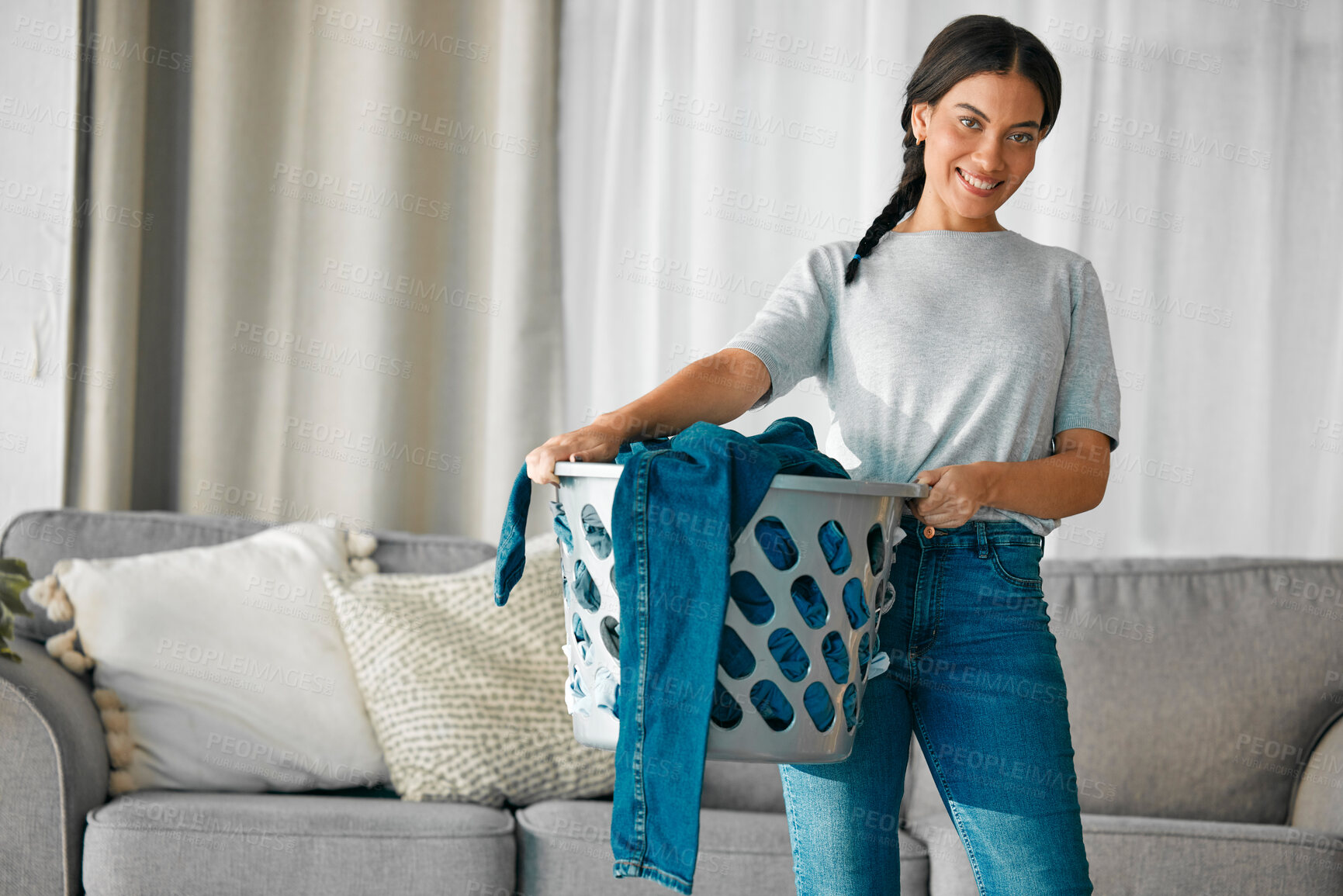 Buy stock photo Laundry, clothes and portrait of woman with basket for cleaning, housekeeping and maintenance at home. Housework, washing and happy girl in living room carry container for linen, fabric and material