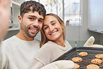 Kitchen, portrait and couple baking cookies together for love, bonding and romance at home. Bake, smile and happy young man and woman preparing biscuits or snacks for fun, event or dessert at house.