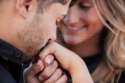 Buy stock photo Love, man kiss hand of woman and celebration for marriage, relationship and happiness for romance. Romantic, couple and gesture for joy, Valentines day and bonding together, loving and achievement