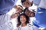 Doctor, group portrait and below circle for motivation, support and collaboration with smile, solidarity and diversity. Friends, doctors and face with teamwork, goals and help in healthcare at clinic