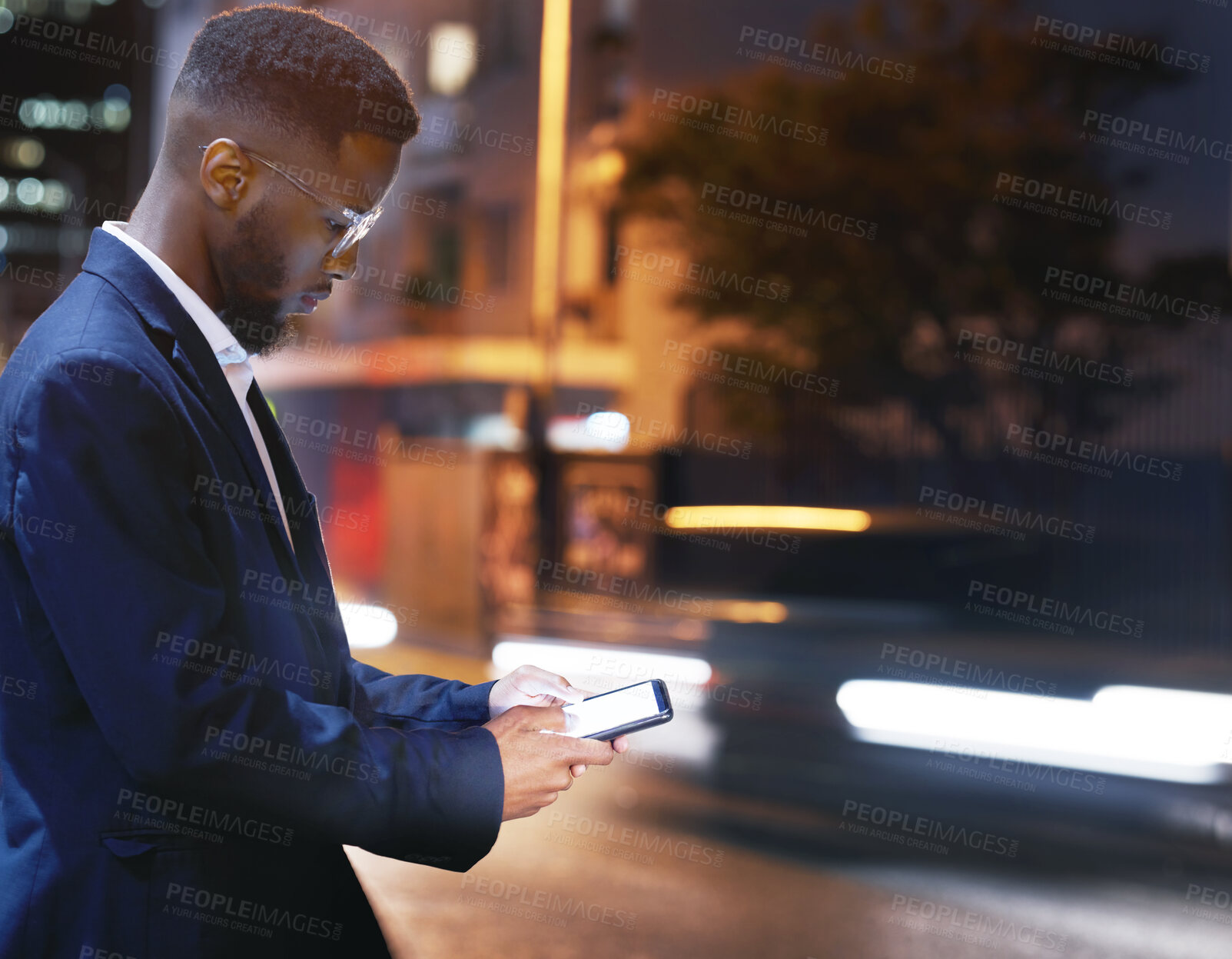 Buy stock photo Phone, business and black man in city at night, street or outdoors in town for texting. 5g mockup, technology and male employee with smartphone for social media, internet browsing or web scrolling.