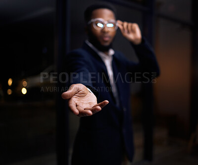 Buy stock photo Businessman, hands and hiring at night for recruitment, opportunity or welcome to the office. Black male with hand out for hire, help or corporate growth on dark background or mockup at the workplace