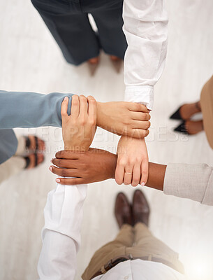Buy stock photo Support, business team and holding hands for work community, office and teamwork. Team building, diversity and group collaboration above of corporate employees with solidarity and hope together