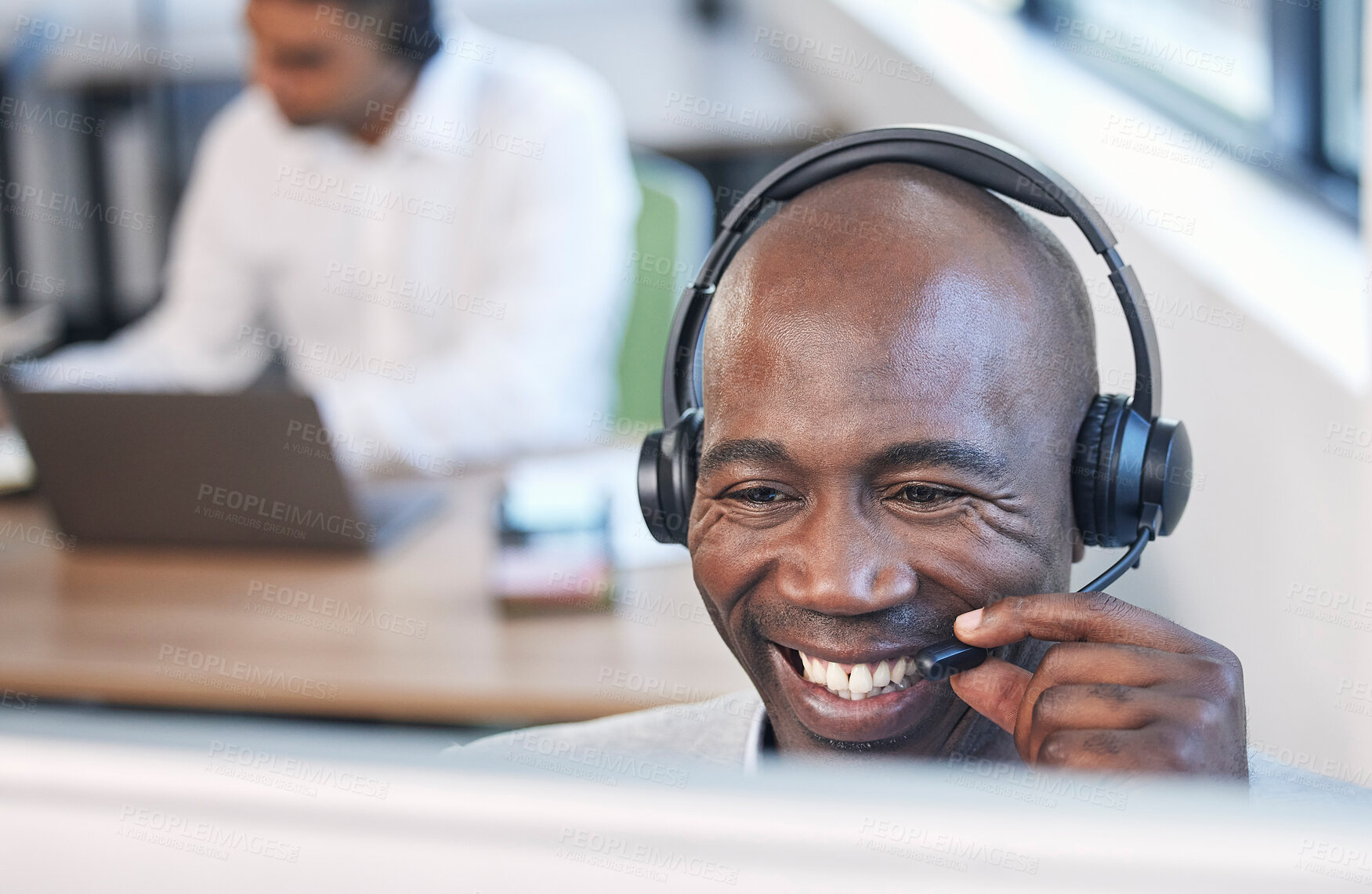 Buy stock photo Crm, call center and black man with a smile from business, contact us and telemarketing call. Office, consulting and web support employee working on an online consultation for digital help and advice