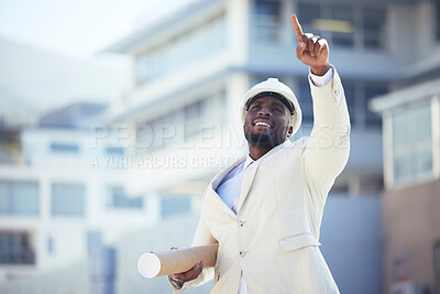 Buy stock photo Engineering, planning and construction worker at an outdoor site managing building, repairs or maintenance. Industry, architect and black man industrial worker working on architecture project in city