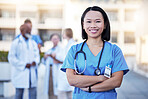 Happy asian doctor or woman in portrait for hospital leadership, internship opportunity or career integrity. Face of proud healthcare worker, nurse or person for medical services goals and mission