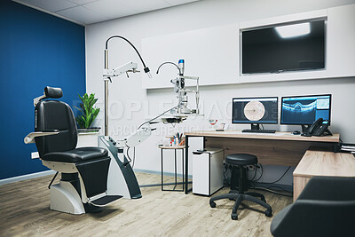 Buy stock photo Optometry, empty room and equipment for vision test for eye care in a optical clinic or store. Optic healthcare, ophthalmology and computers, technology or machines in optometrist consultation office