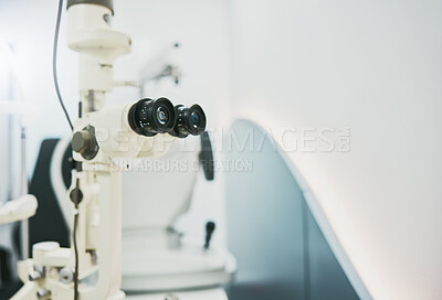 Buy stock photo Ophthalmology machine, eye care and interior for medical healthcare, wellness or vision in clinic office. Optometrist consultation room, help or technology for digital equipment by blurred background