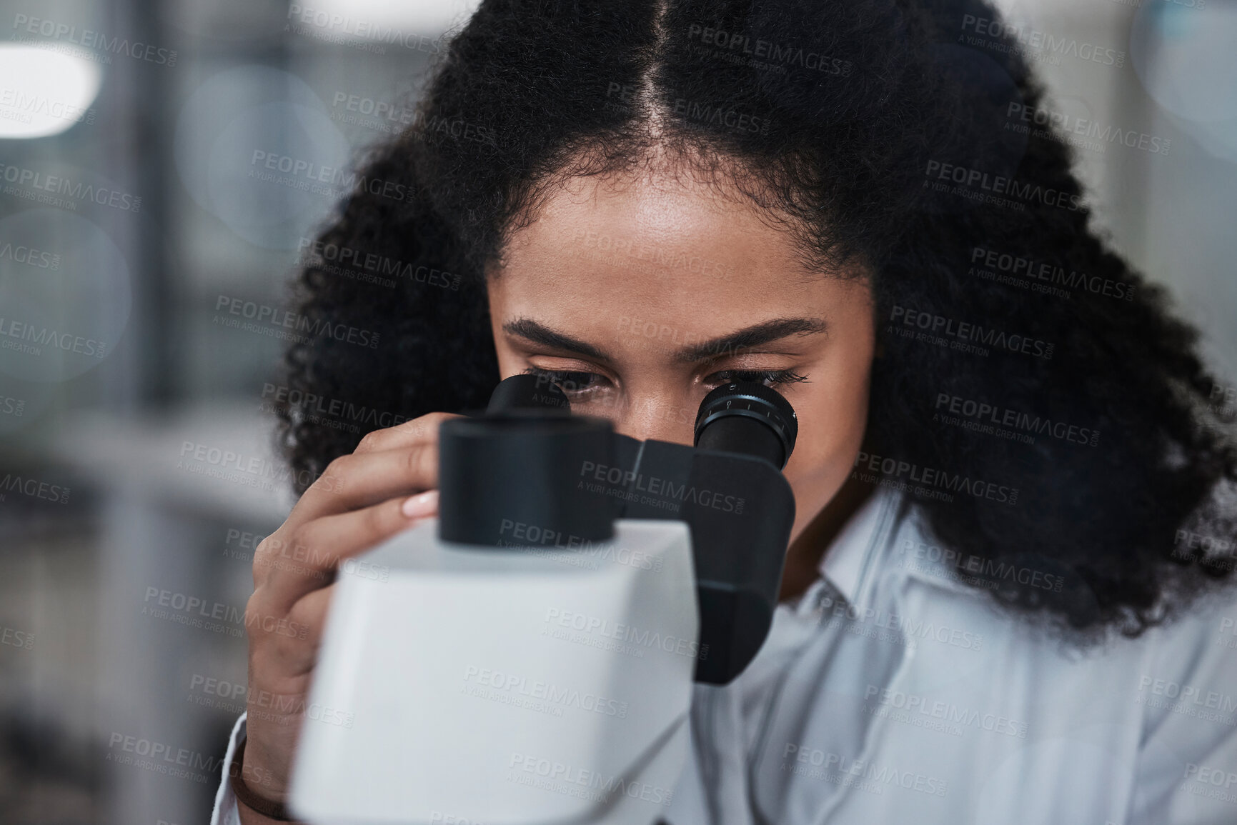 Buy stock photo Science, microscope and research with a doctor black woman at work in a lab for innovation or development. Medical, analysis and sample with a female scientist working in a laboratory on breakthrough