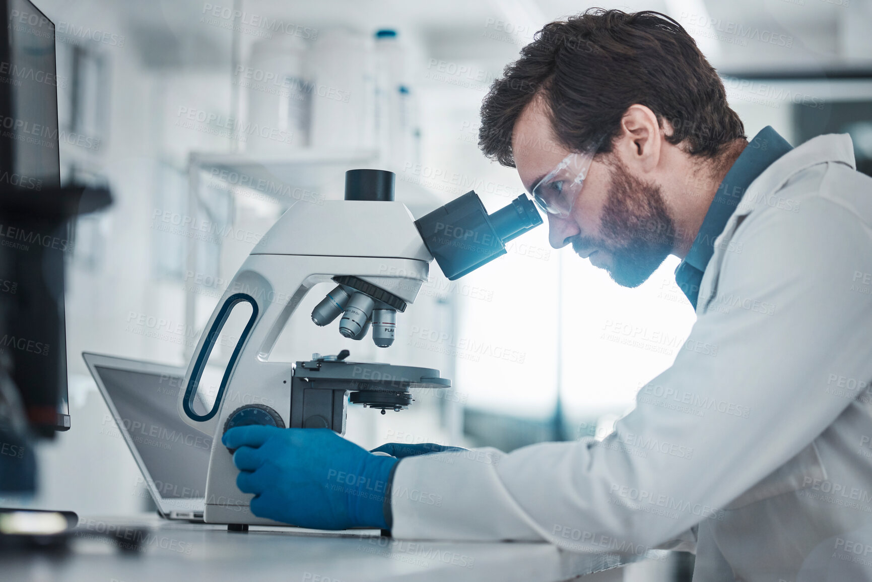 Buy stock photo Medical, microscope and laboratory research of expert checking health sample for bacteria study. Chemistry lab, biotechnology and scientist working on chemical innovation and dna analytics 