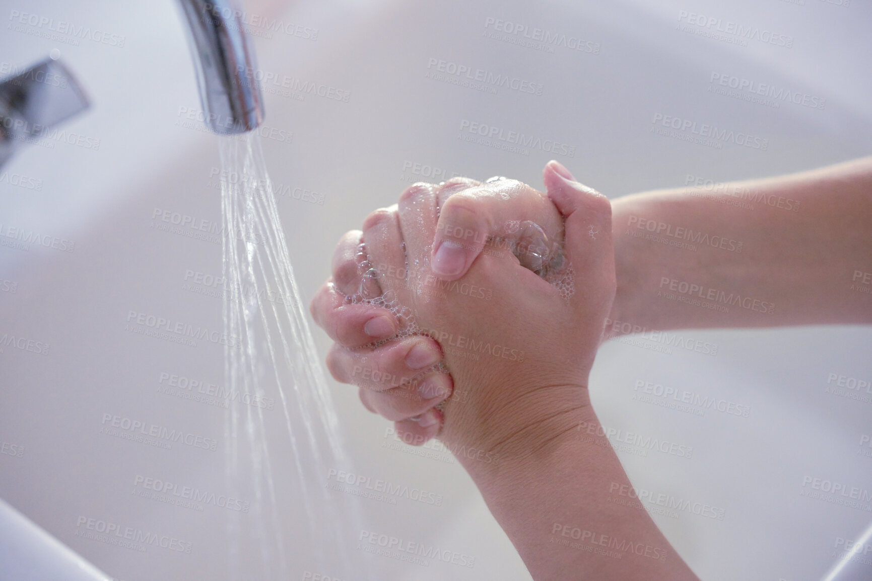 Buy stock photo Hygiene, above and person washing hands with water for health, disinfection and virus protection. Soap, healthy and liquid from a basin to wash, clean and prevent disease on fingers of a human