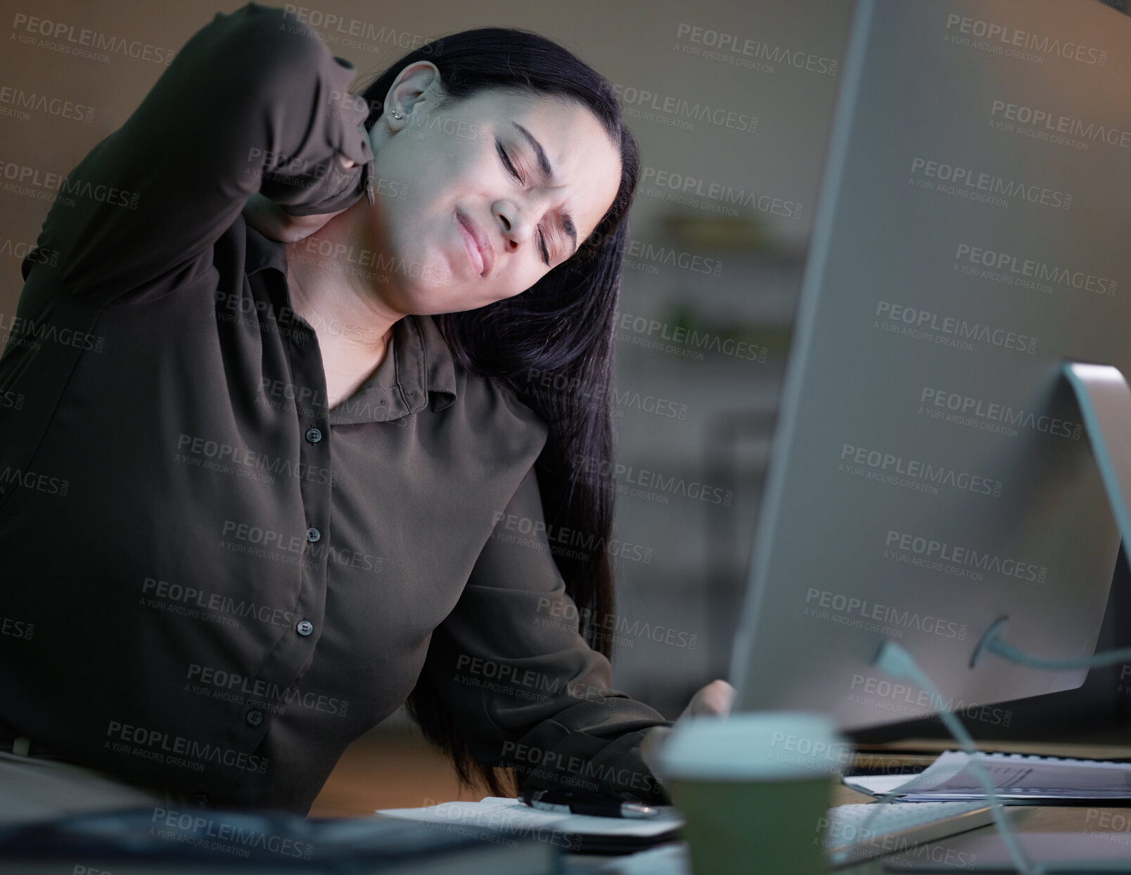 Buy stock photo Woman with neck pain, working at night in office with computer and mental health of corporate business worker. Young overworked person at desk, backache from late workload and employee burnout