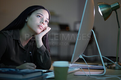 Buy stock photo Tired, bored woman at her computer studying at night with depression, burnout or mental health risk. Sleepy, sad or depressed young person or student with fatigue, low energy and working at desk