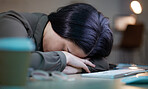 Tired, sleeping woman at her computer at night for depression, burnout and mental health risk. Business person, worker or employee fatigue, low energy and depressed sleep on pc for project deadline