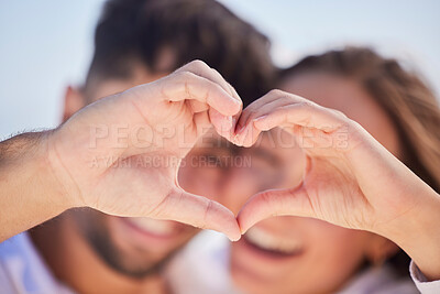 Buy stock photo Heart shape, happy and couple on a date for valentines day, romance or anniversary vacation. Happiness, holiday and young man and woman with a love hand sign or gesture while on a weekend trip.