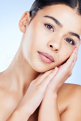 Buy stock photo Portrait, aesthetic and spa with a model black woman in studio on a blue background for skincare. Face, beauty and skin with an attractive young female posing to promote natural facial treatment