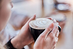 Latte cup, woman hands with art for customer services, restaurant creativity and hospitality industry with inspiration. Cafe shop with person hand holding espresso, cappuccino or morning coffee drink