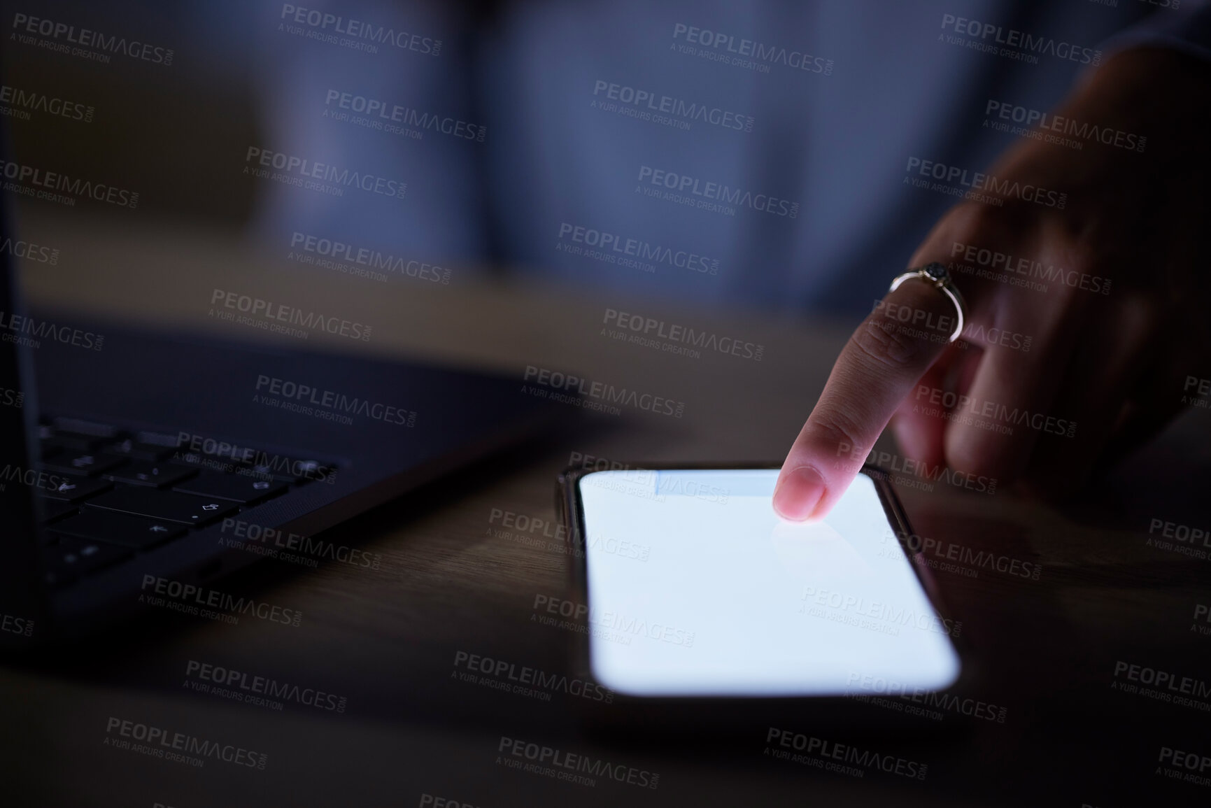 Buy stock photo Social media, mockup phone and hands of a woman typing for communication in the dark at work. Contact, space and employee scrolling on a mobile screen for chat, news and information late at night