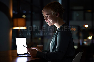 Buy stock photo Woman texting, office and night with smile, smartphone or blank laptop screen for chat app, online dating and reading. Corporate workplace, dark and young executive with phone, social media and web
