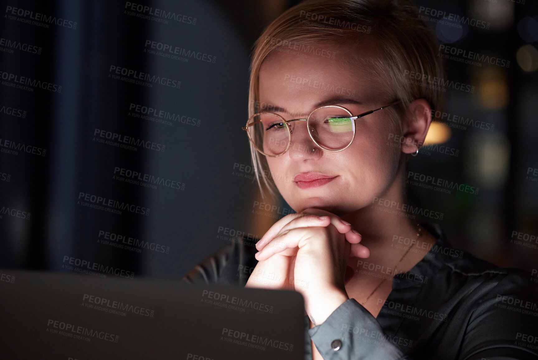 Buy stock photo Night, laptop and reflection with woman in office for overtime, planning and serious. Glasses, technology and internet with employee and deadline at desk for goals, management solution and email