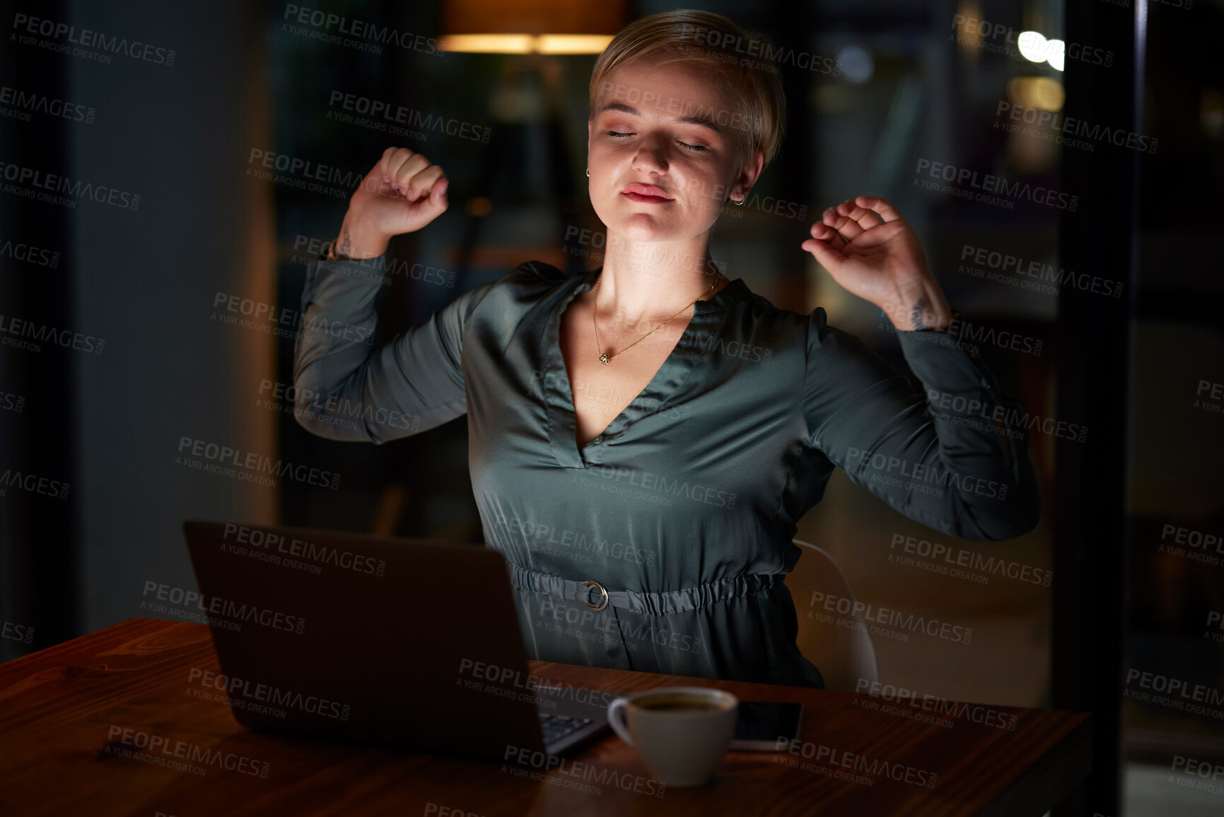 Buy stock photo Young woman stretching at desk for night health, muscle wellness and calm energy with work life balance. Business worker, employee or person on laptop with fatigue, tired and self care in office