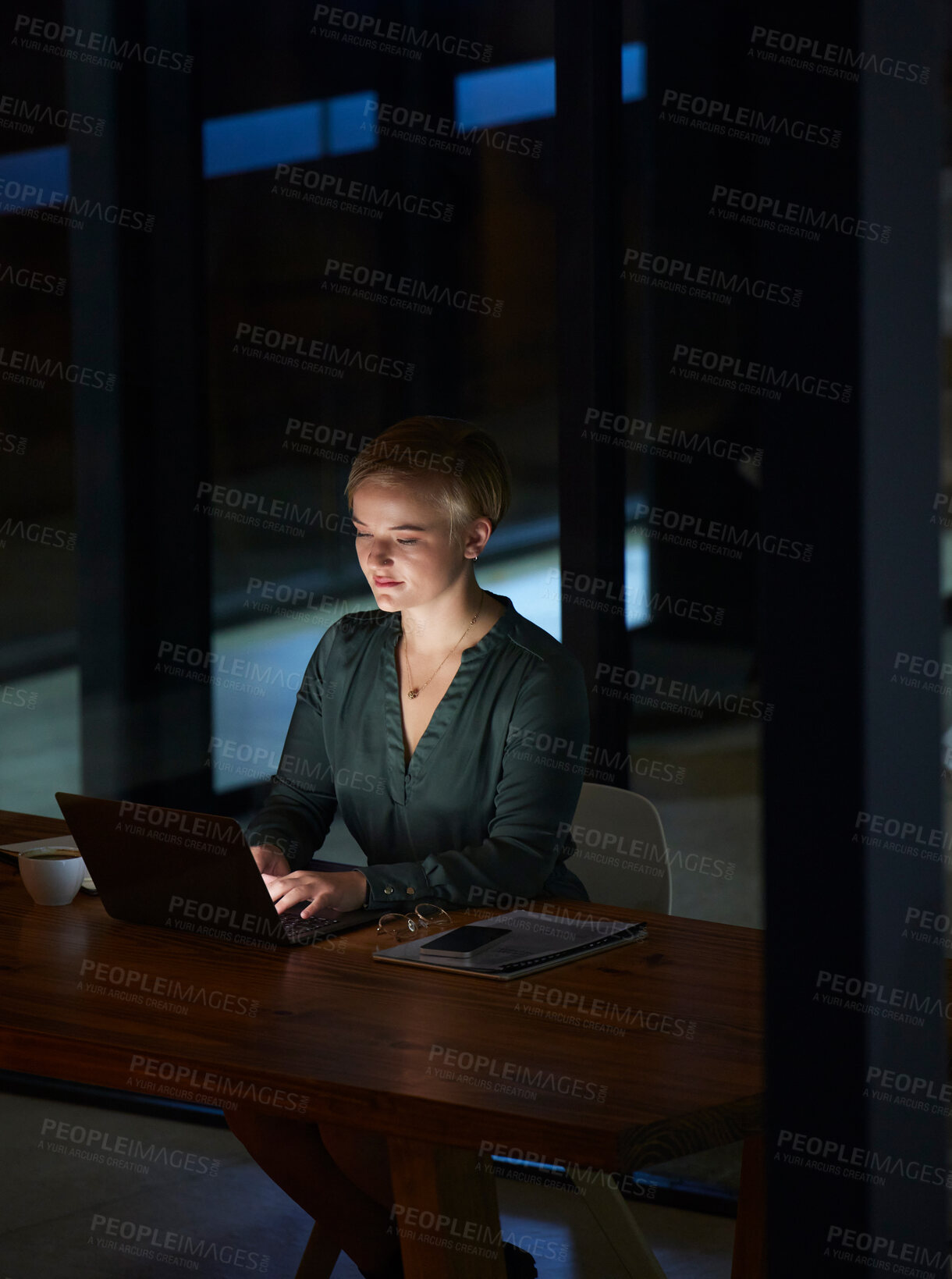 Buy stock photo Night, laptop and serious with business woman in office for planning, overtime and corporate strategy. Deadline, technology and email with employee typing at desk for proposal, trading and internet