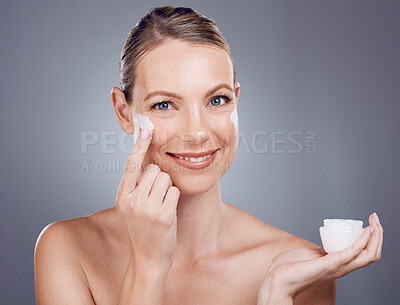 Buy stock photo Cream, jar and woman skincare for face, smile or cosmetics on studio background. Facial portrait, beauty lotion and model with container of healthy glow, mature shine and advertising aesthetic makeup