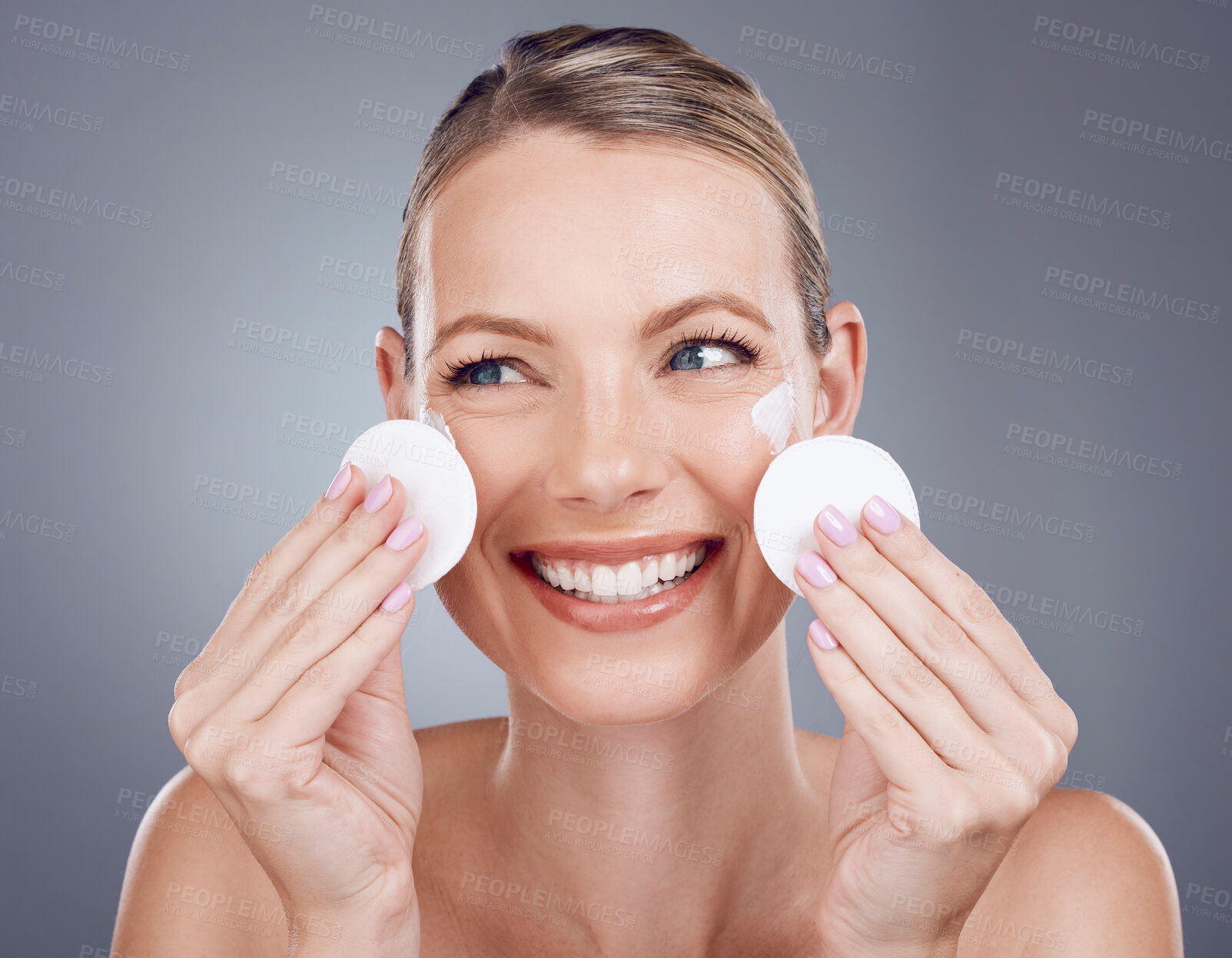 Buy stock photo Skincare, cotton pad and face of woman on gray background for wellness, cosmetics and facial treatment. Beauty, dermatology and happy girl with patches for makeup removal, spa products and cleaning