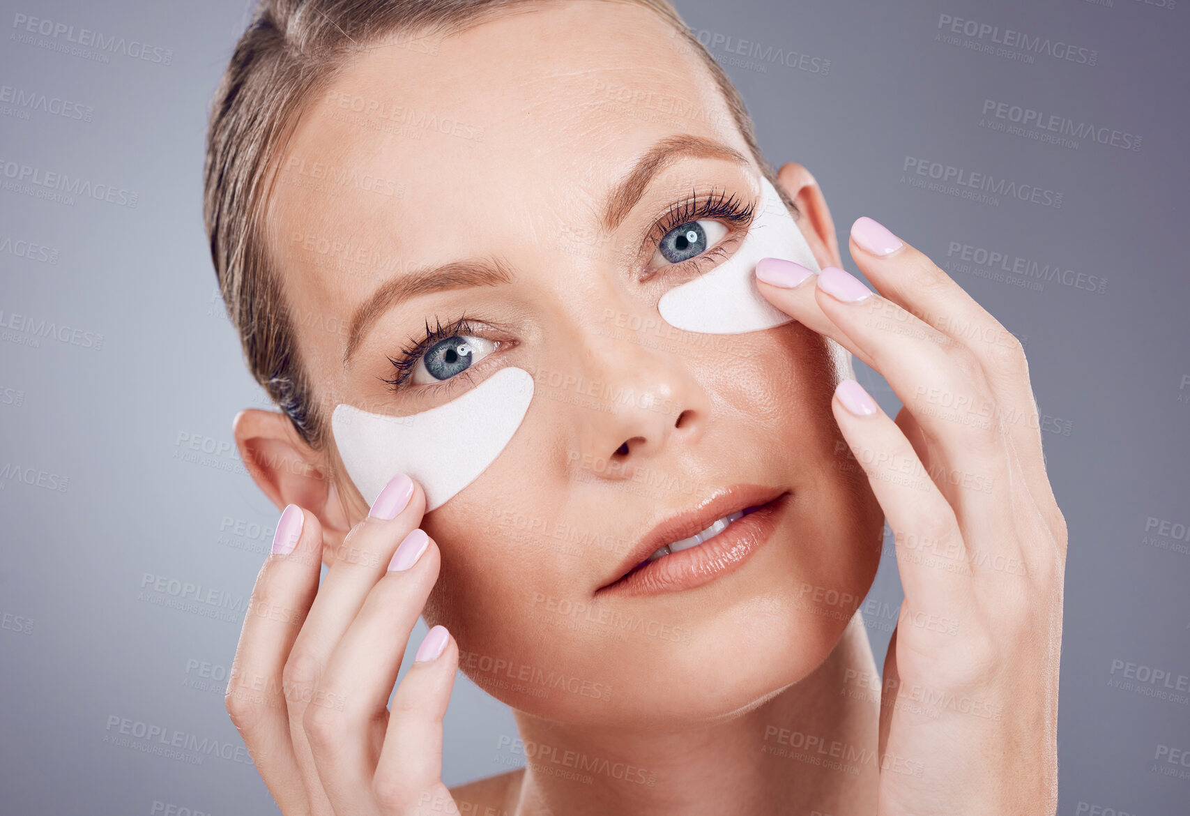 Buy stock photo Skincare mask, eyes and portrait of woman on gray background for wellness, cosmetics and facial treatment. Health, dermatology and face of girl with patches for anti aging, makeup and beauty products
