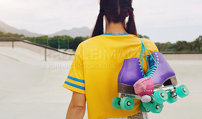 Buy stock photo Rollerskate, mockup and back with a woman at a skatepark for fun, recreation or training outdoor. Fitness, skating and hobby with a female skater walking outside on a ramp for sports practice