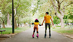 Mother, roller skates and child learning to skate at nature park for exercise, balance and freedom. Woman and black girl kid or family outdoor to play with helmet for safety, trust and love in summer