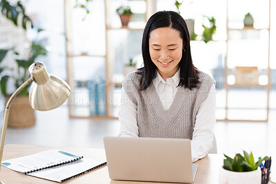 Buy stock photo Asian woman, typing and laptop at startup with smile, planning and focus seo management. Young executive, social media content manager and computer in office for schedule, analysis and networking